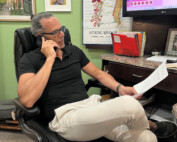 Dr. Heath McKinley in the office on the phone